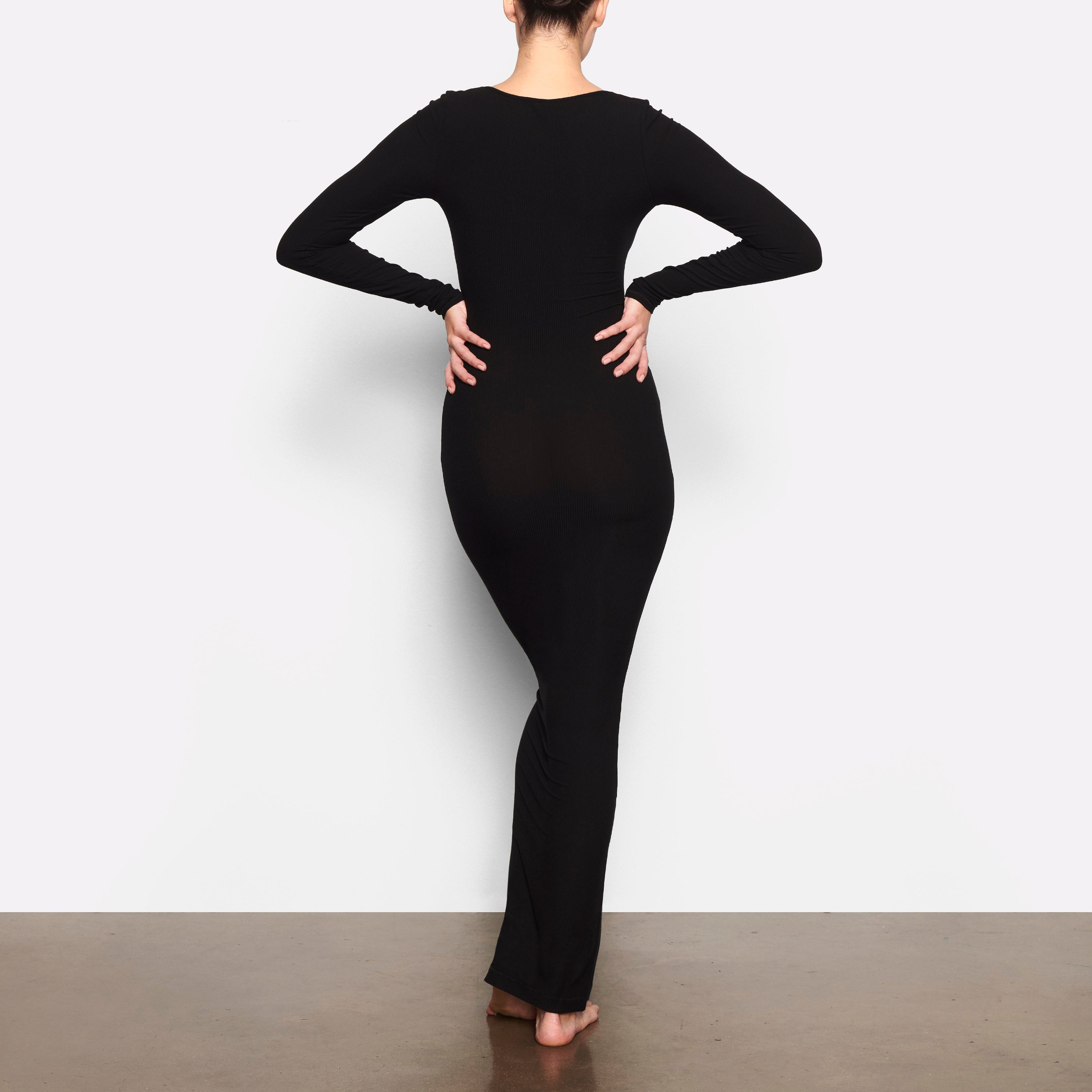 tight black long sleeve dress